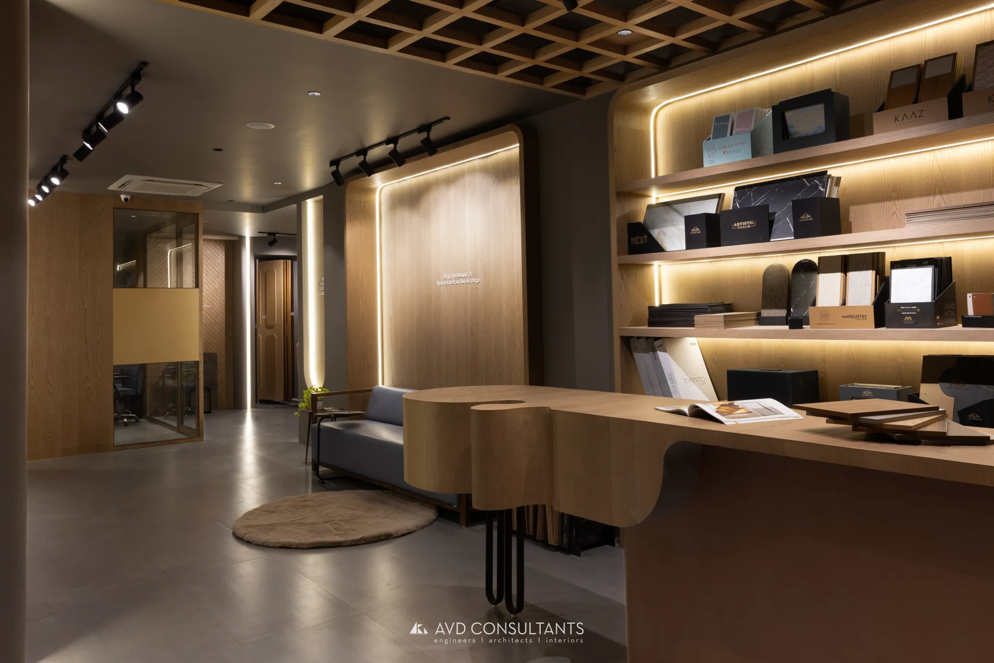 KAAZ Showroom — A three-storey veneer and laminate display space where wood, metal and raw concrete argue politely.